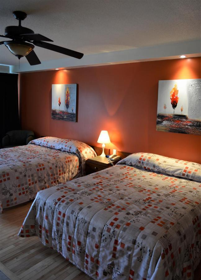Motel Quatre Saisons Форествилл Экстерьер фото